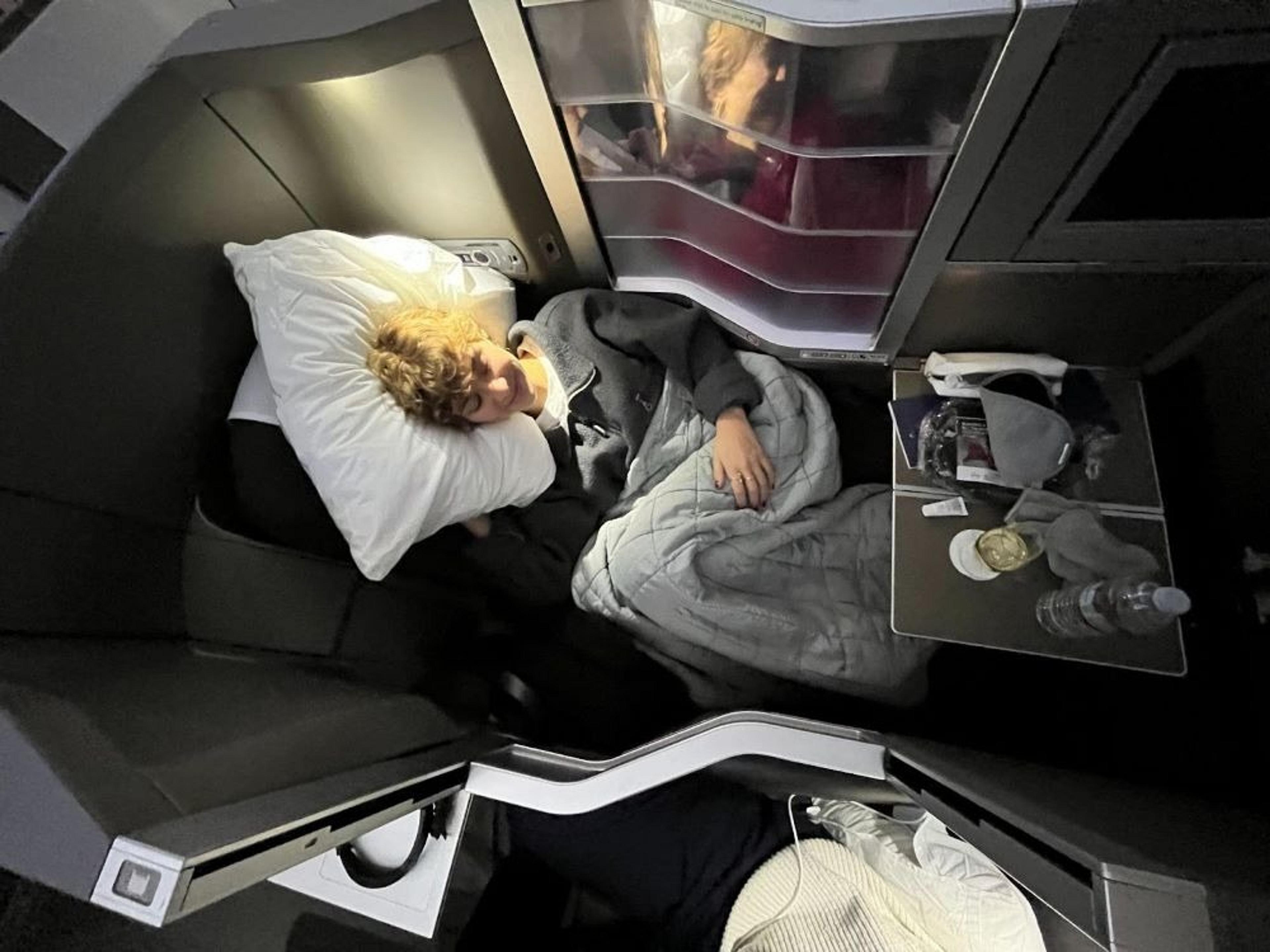 Fran taking a nap in Club World