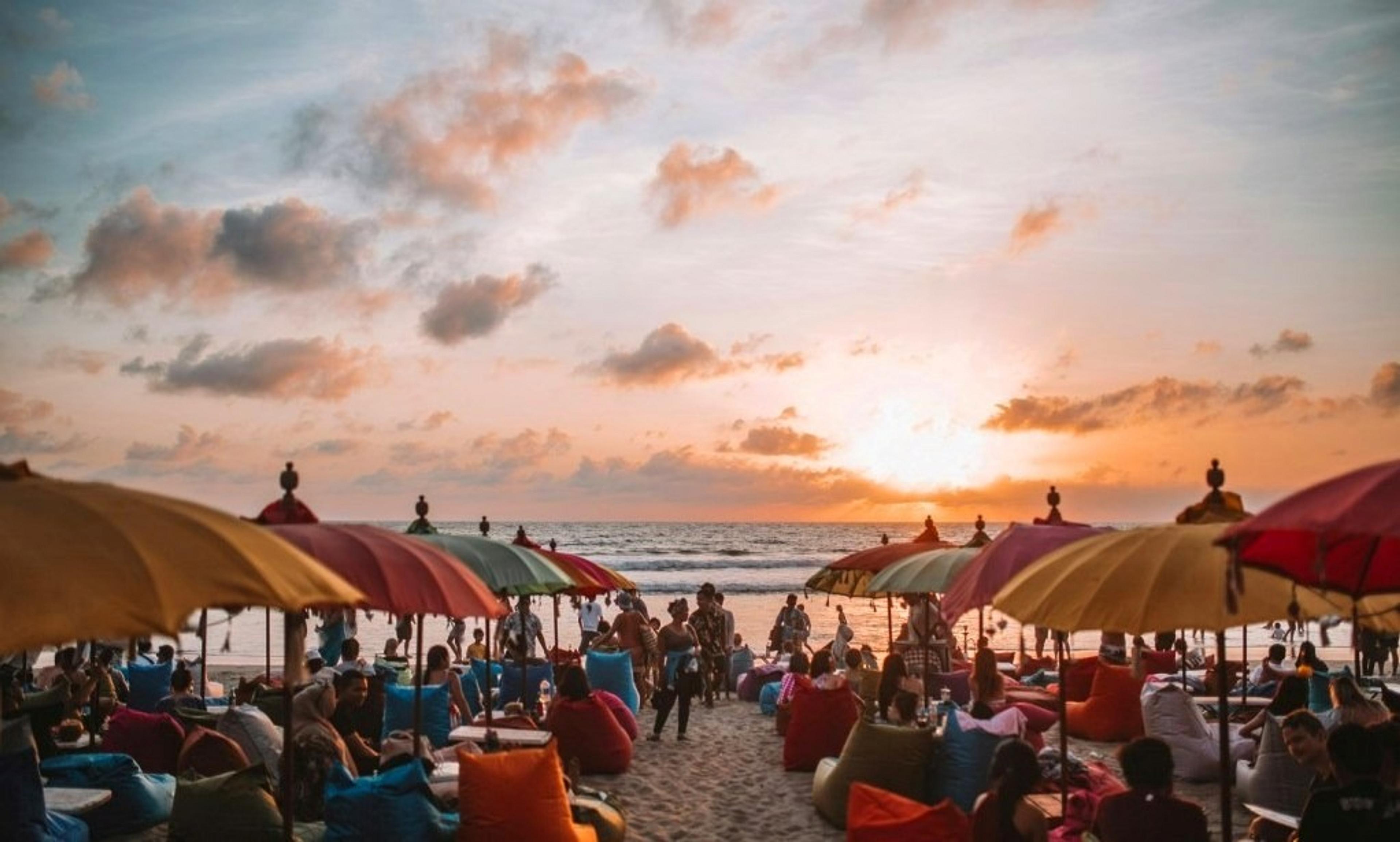 Busy beach with umbrellas