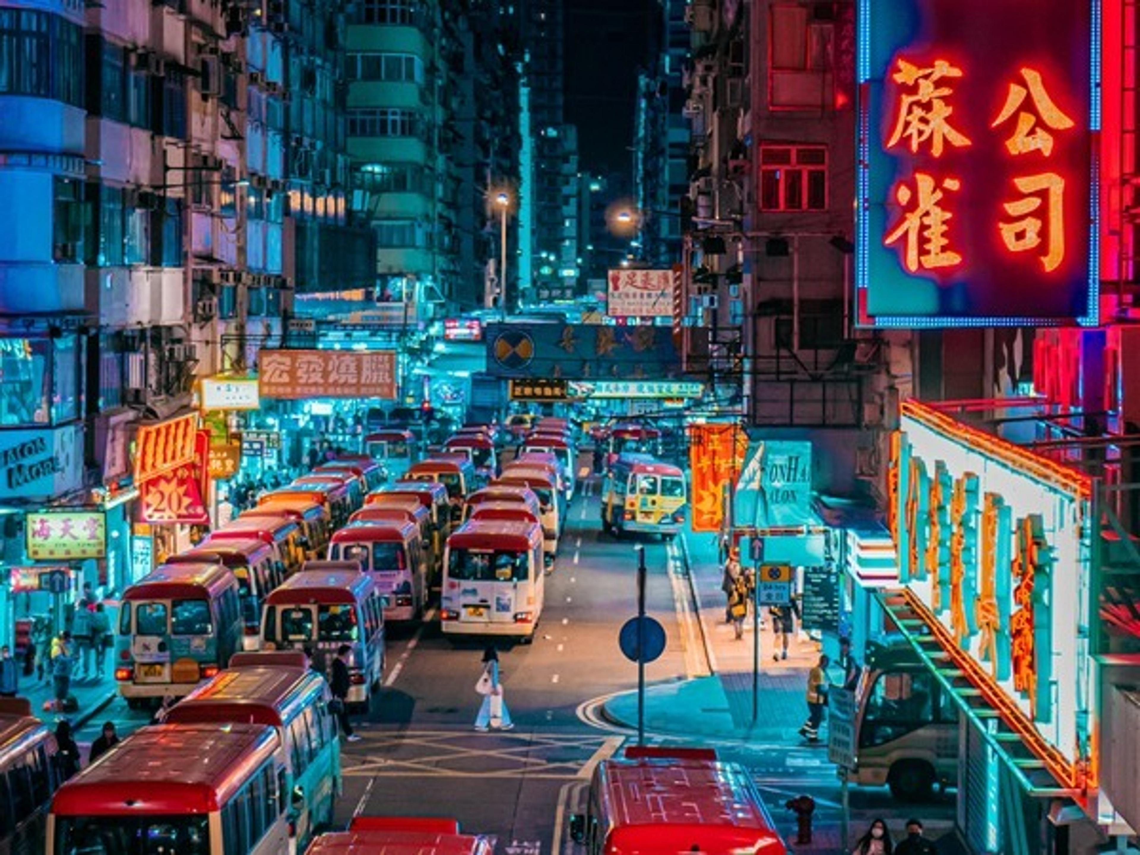 Neon signs and busy street in Hong Kong