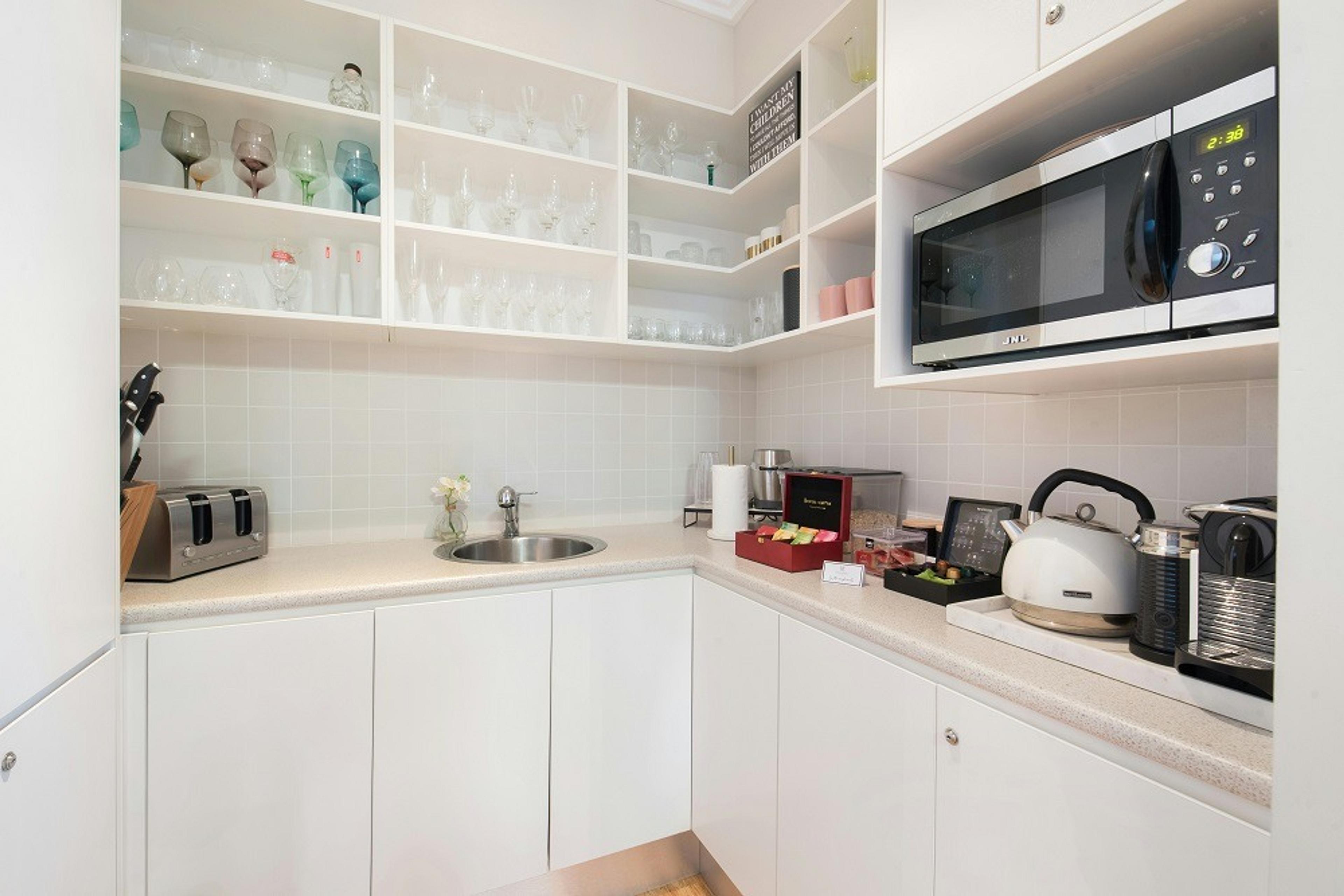 Small kitchen with only a microwave