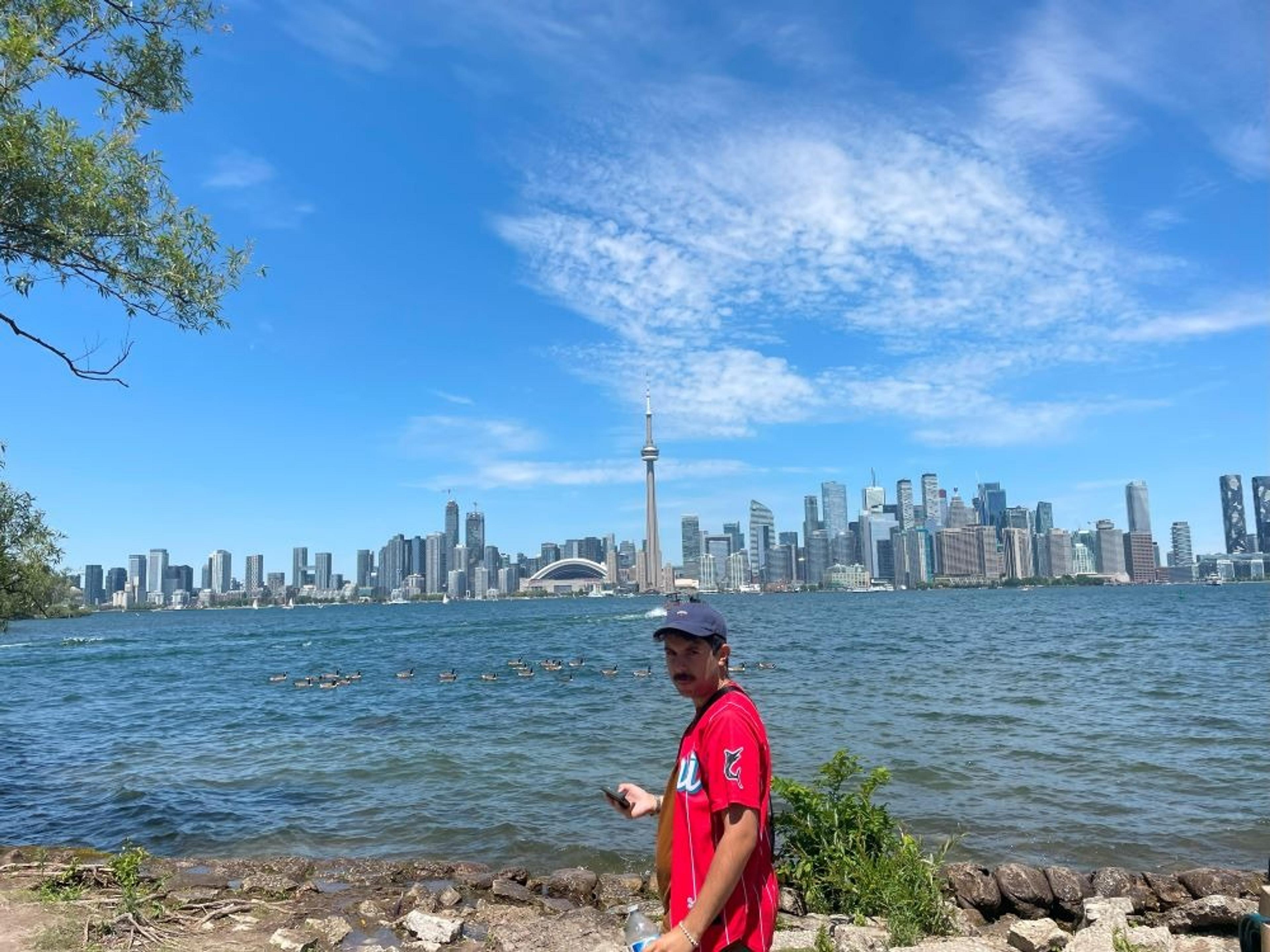 Allan in front of the Toronto skyline