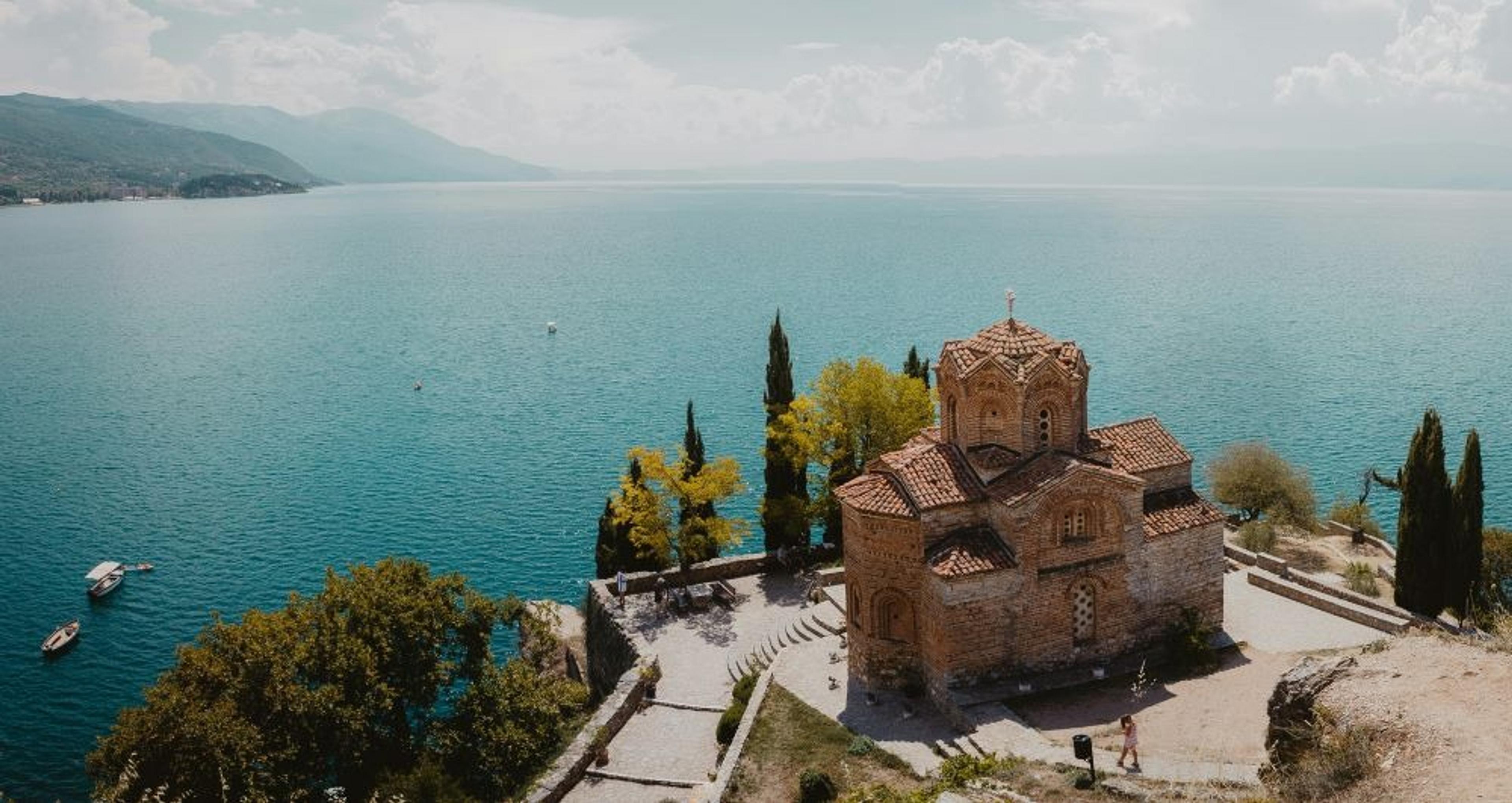 Monastery perched on the side of a large lake Ohrid